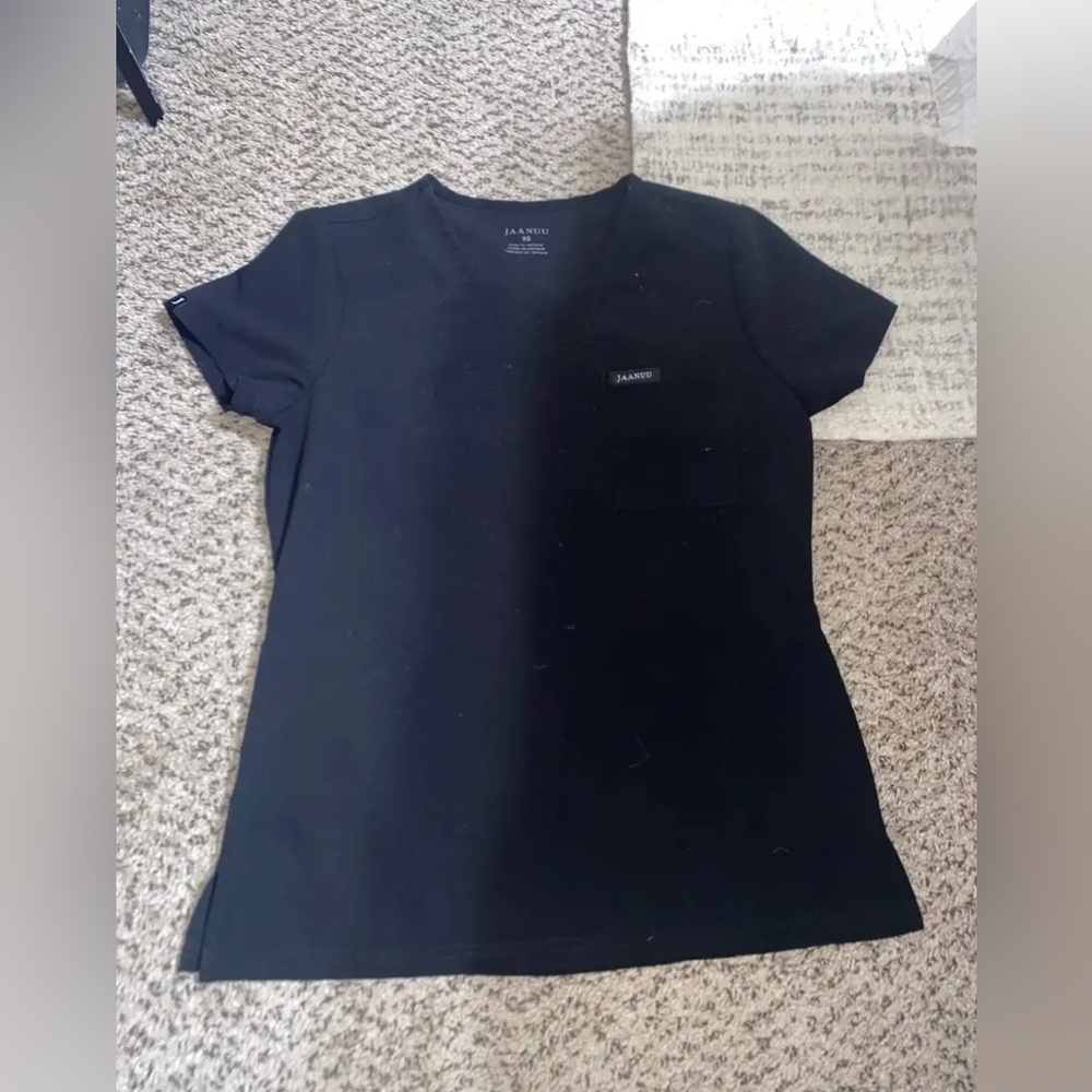 Size XS black jaanuu scrubs lightly worn